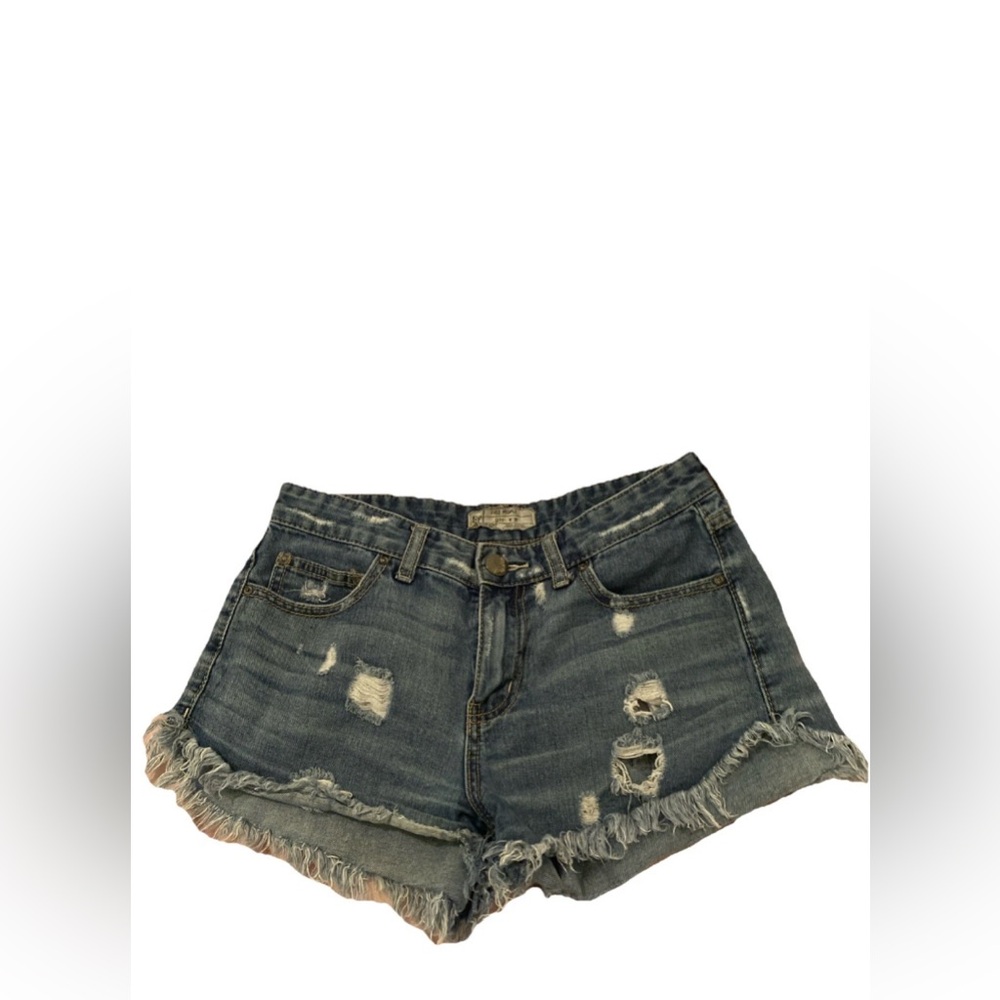 Free People 
Denim shorts 
Cut off